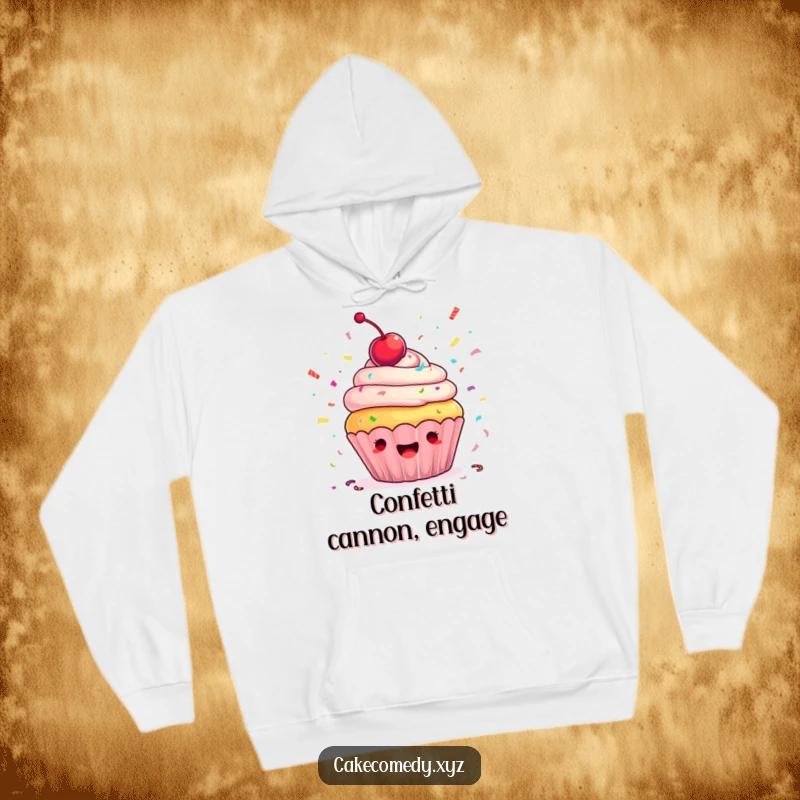 Funny cupcake hoodie depicting an ecstatic cupcake with a cherry, joyfully throwing colorful confetti, designed for ultimate comfort and humor.