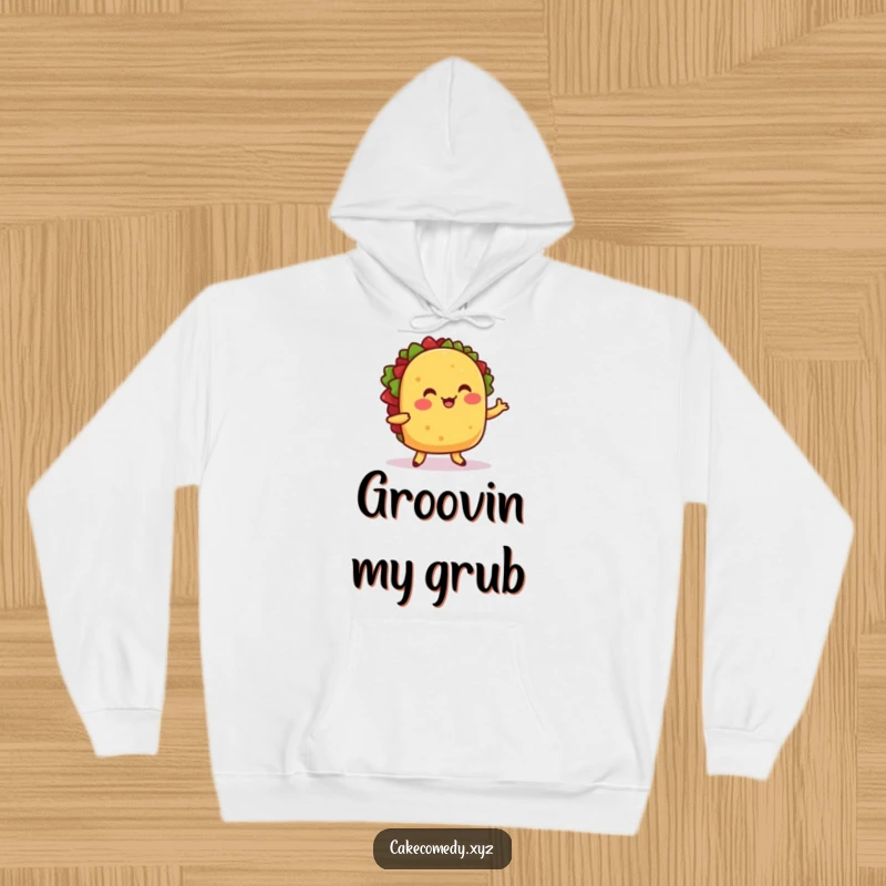 Funny hoodie featuring a cheerful taco dancing with little feet, providing warmth and a festive, humorous vibe.